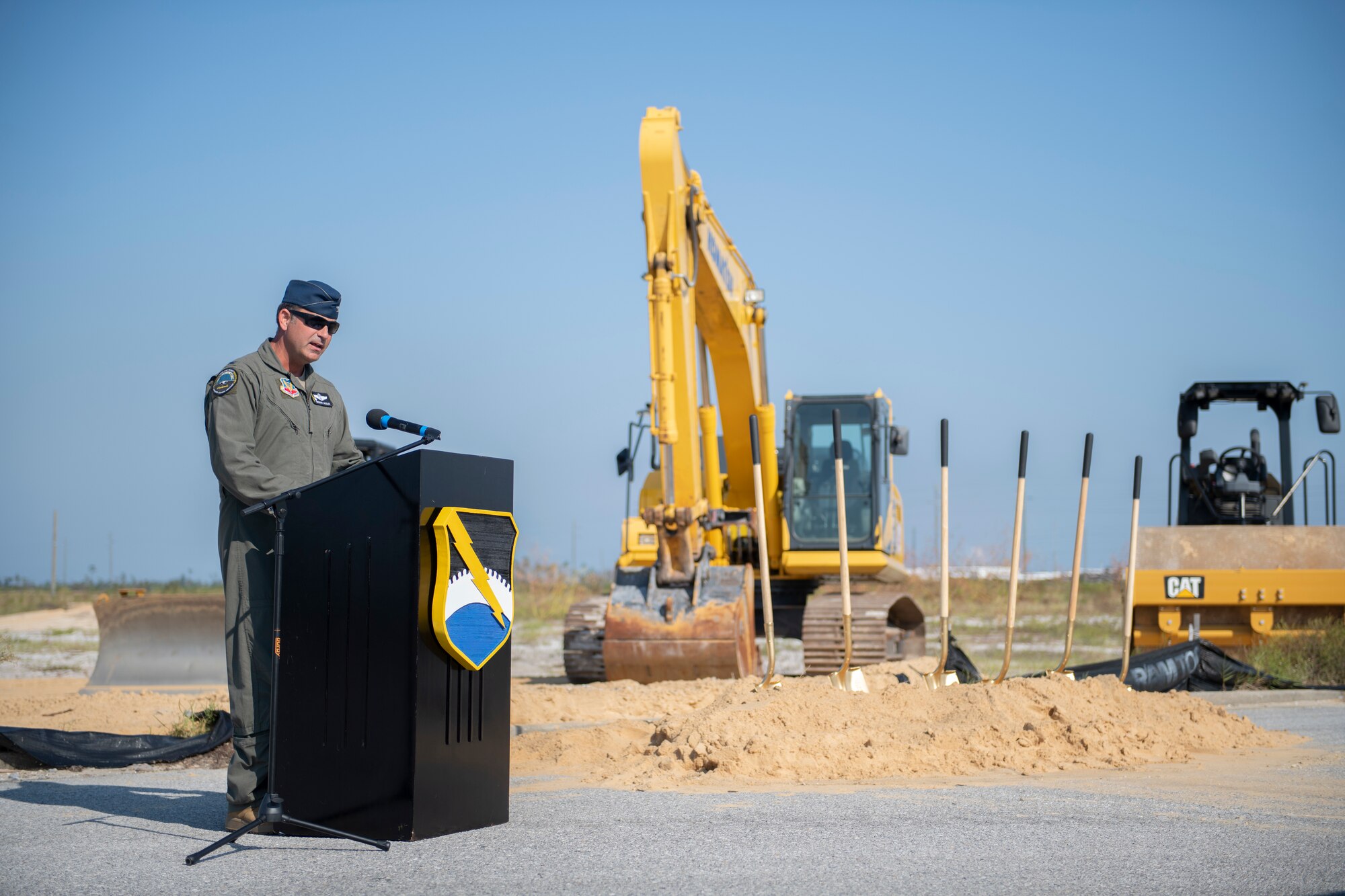 man speaks from podium