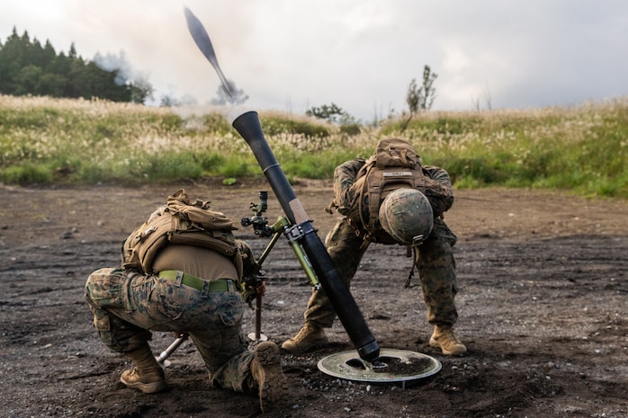 U.S. Marines fire an M252A2 81mm mortar at a live-fire mortar displacement range at Combined Arms Training Center, Camp Fuji, Japan, Oct. 1.