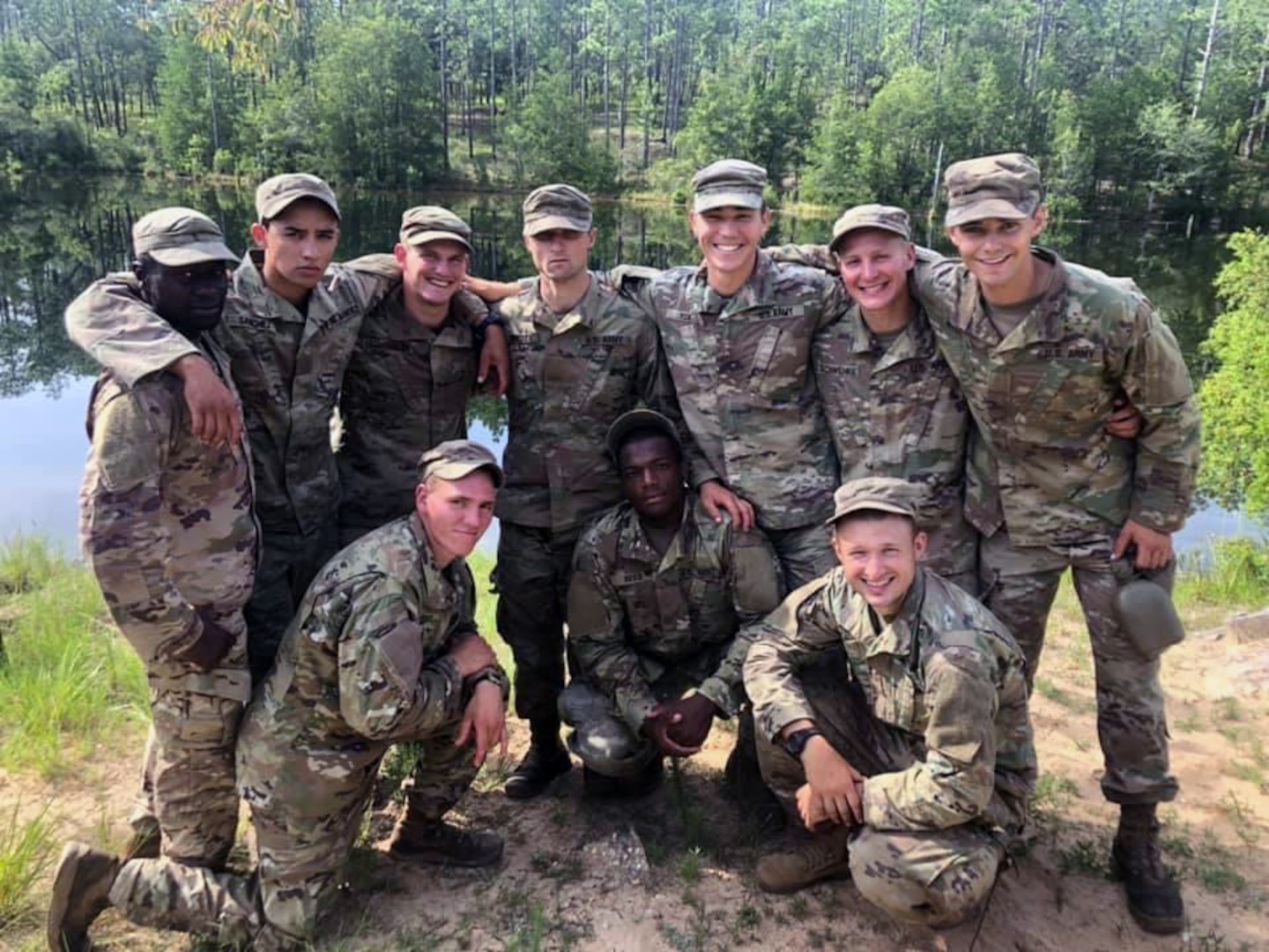 New York Army National Guard Pfc. Jason Snyder, standing at center, marks his completion of the U.S. Army Ranger Course with fellow Rangers Aug. 27, 2020, at Fort Benning, Georgia.