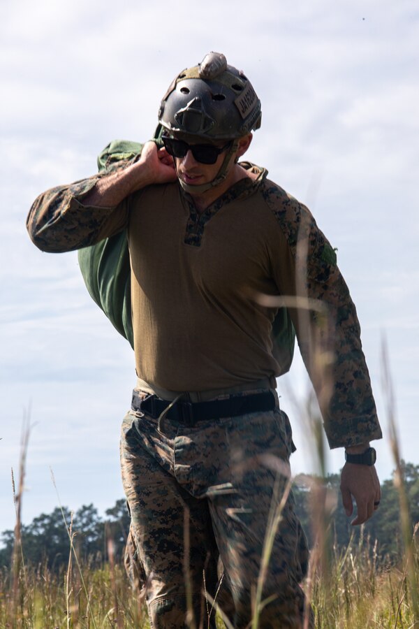A Marine with 3rd Force Reconnaissance Company, 4th Marine Division returns a parachute after free-fall jumps during an airborne operations event at Camp Shelby, Miss., Oct. 6, 2020. 3rd Force Recon conducts this training to review and refine the unit’s standard operating procedures for airborne operations, while also increasing parachutists’ proficiency in performance during airborne training. (U.S. Marine Corps photo by Cpl. JVonnta Taylor)