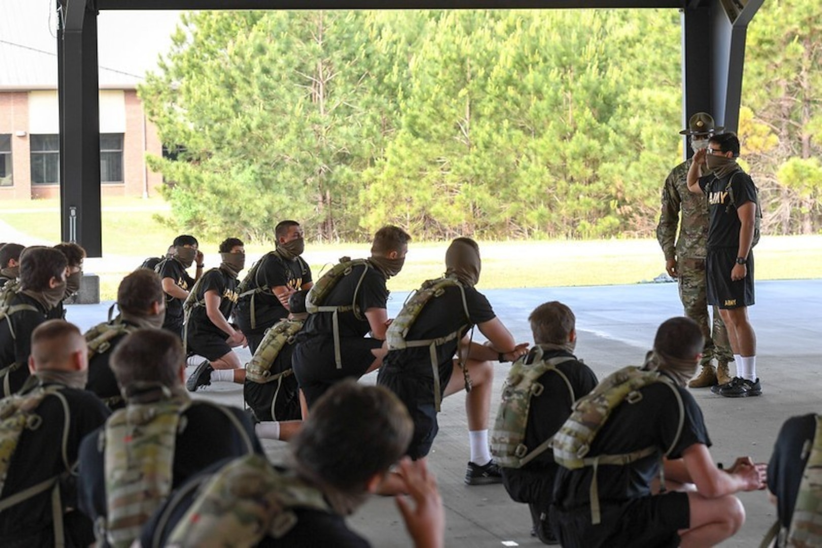 Secretary of the Army Ryan D. McCarthy and Sgt. Maj. of the Army Michael A. Grinston watch Soldiers engage in training on Fort Benning, Georgia, April. 29, 2020.