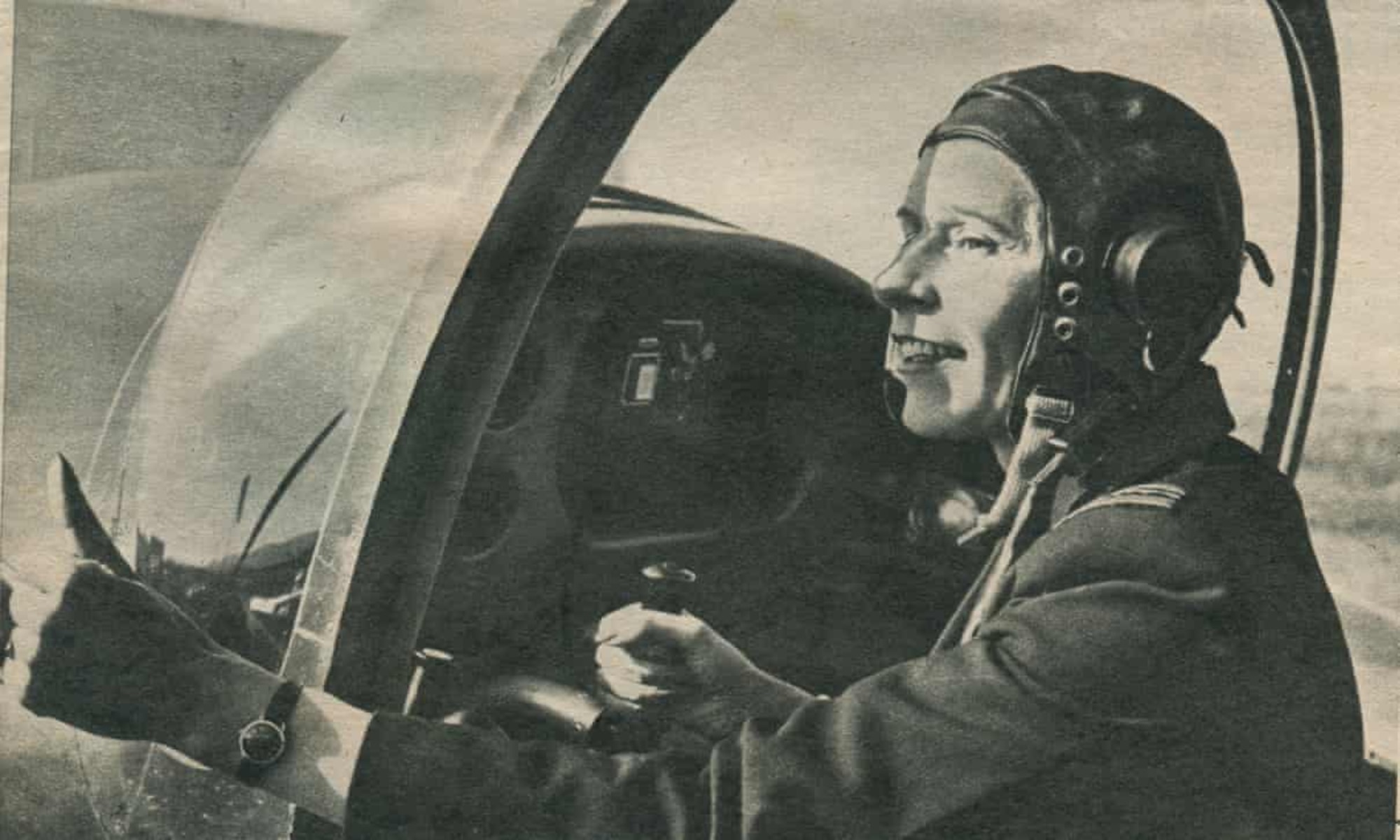 Picture of Mary Wilkins-Ellis in cockpit of an aircraft.