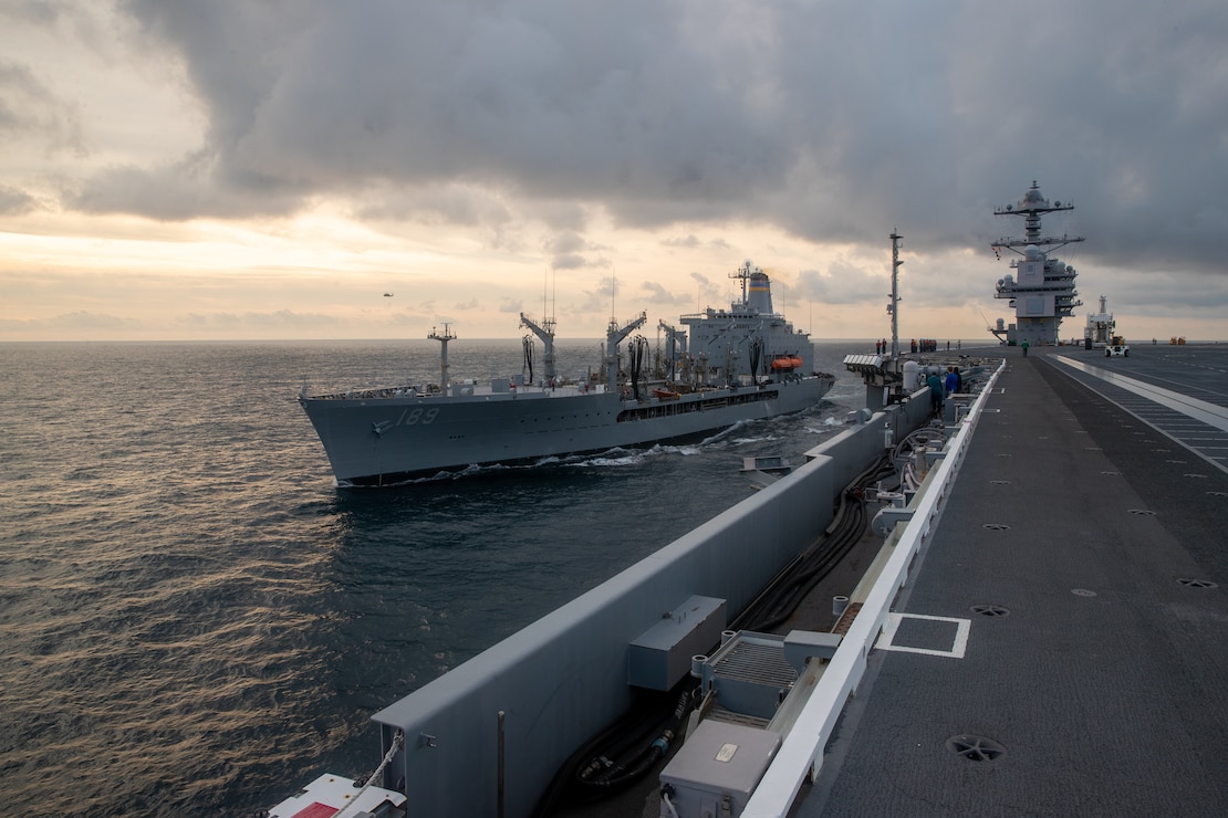 USNS John Lenthall and USS Gerald R. Ford conduct a vertical replenishment-at-sea