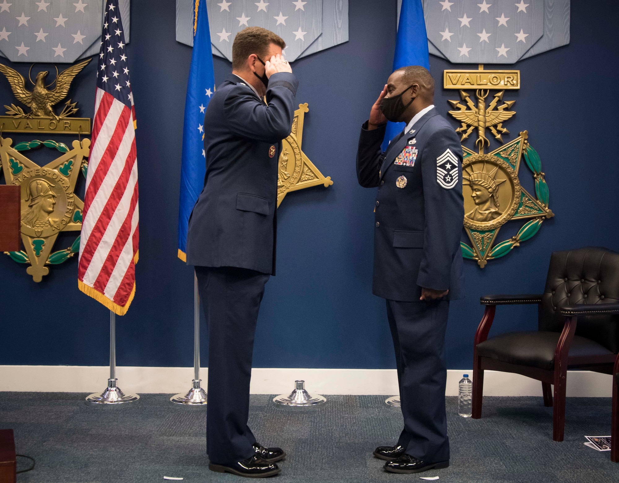 U.S. Air Force Chief Master Sgt. Maurice L. Williams salutes Lt. Gen. Michael A. Loh, Air National Guard (ANG) director, upon assuming the duties of command chief master sergeant of the Air National Guard during an assumption of responsibility ceremony at the Pentagon in Arlington, Va., Oct. 9, 2020. As ANG command chief, Williams represents the highest level of ANG enlisted leadership and will serve as Loh’s principal adviser for all matters influencing the health, morale and welfare of enlisted personnel. (U.S. Air National Guard photo by Tech. Sgt. Morgan R. Lipinski)