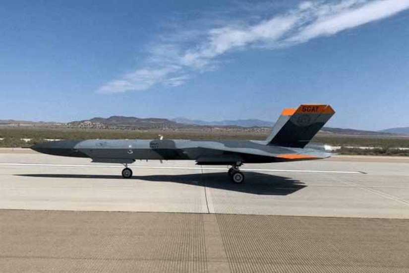 An aircraft sits on a flightline.