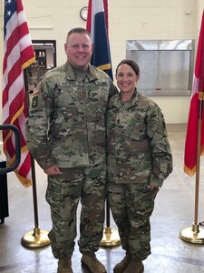 1st SGT David Katzfey and 1st SGT Trisha Katzfey, both of the Missouri Army National Guard, pose for a quick photo.