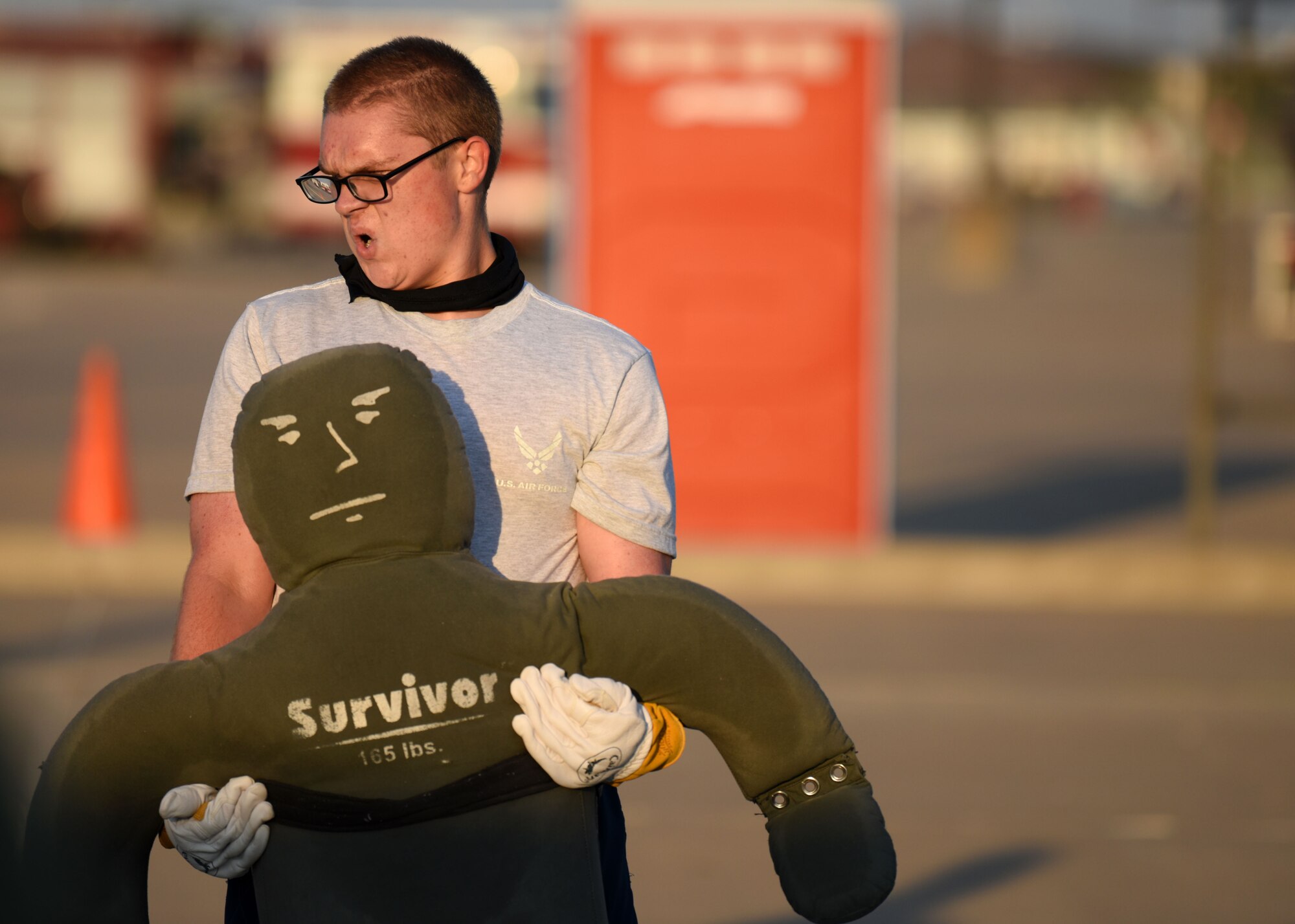 A 312th Training Squadron Student drags a dummy during Blood, Sweat, and Stairs at the Louis F. Garland Department of Defense Fire Academy, on Goodfellow Air Force Base, Texas, Oct. 10, 2020. The dummy drags represented first responders pulling injured victims from the twin towers on 9/11. (U.S. Air Force photo by Airman 1st Class Ethan Sherwood)