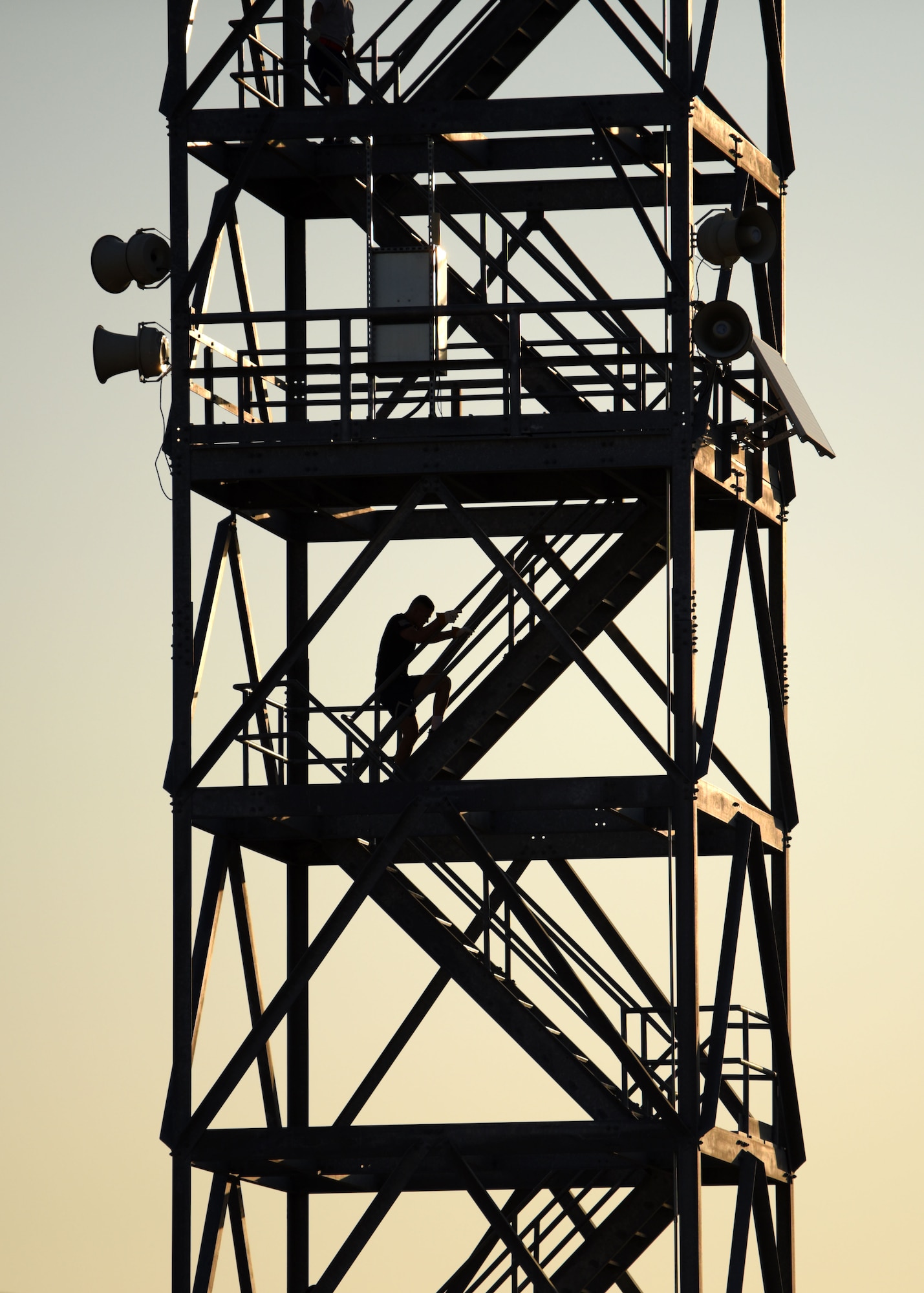 A 312th Training Squadron Student climbs a tower during Blood, Sweat, and Stairs at the Louis F. Garland Department of Defense Fire Academy, on Goodfellow Air Force Base, Texas, Oct. 10, 2020. Contestants went full speed up the 90-foot tower to get a taste of the 110 floors that first responders had to climb during 9/11. (U.S. Air Force photo by Airman 1st Class Ethan Sherwood)