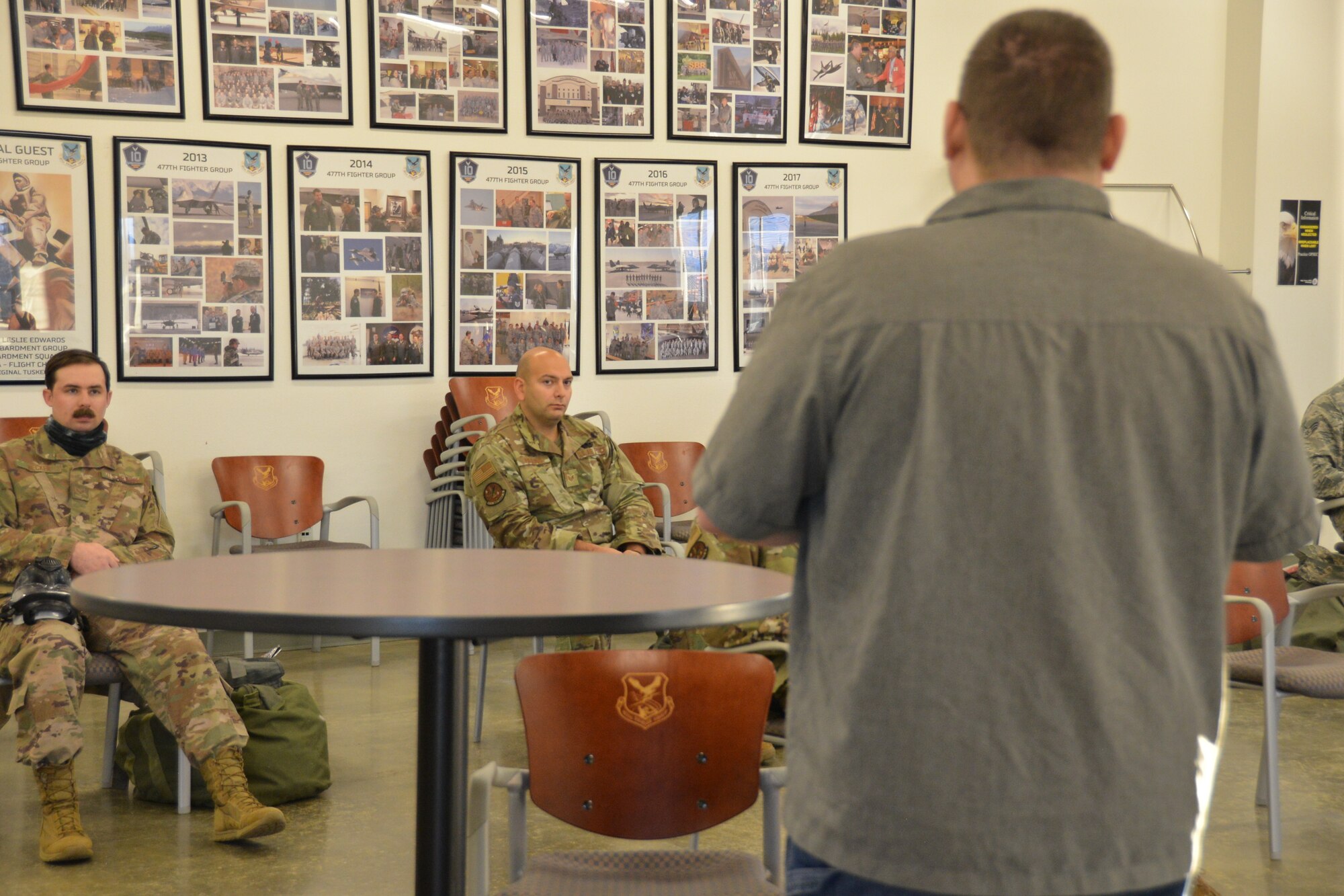 477th Fighter Group Reserve Citizen Airmen look on, as the instructor speaks, Oct. 4, 2020.