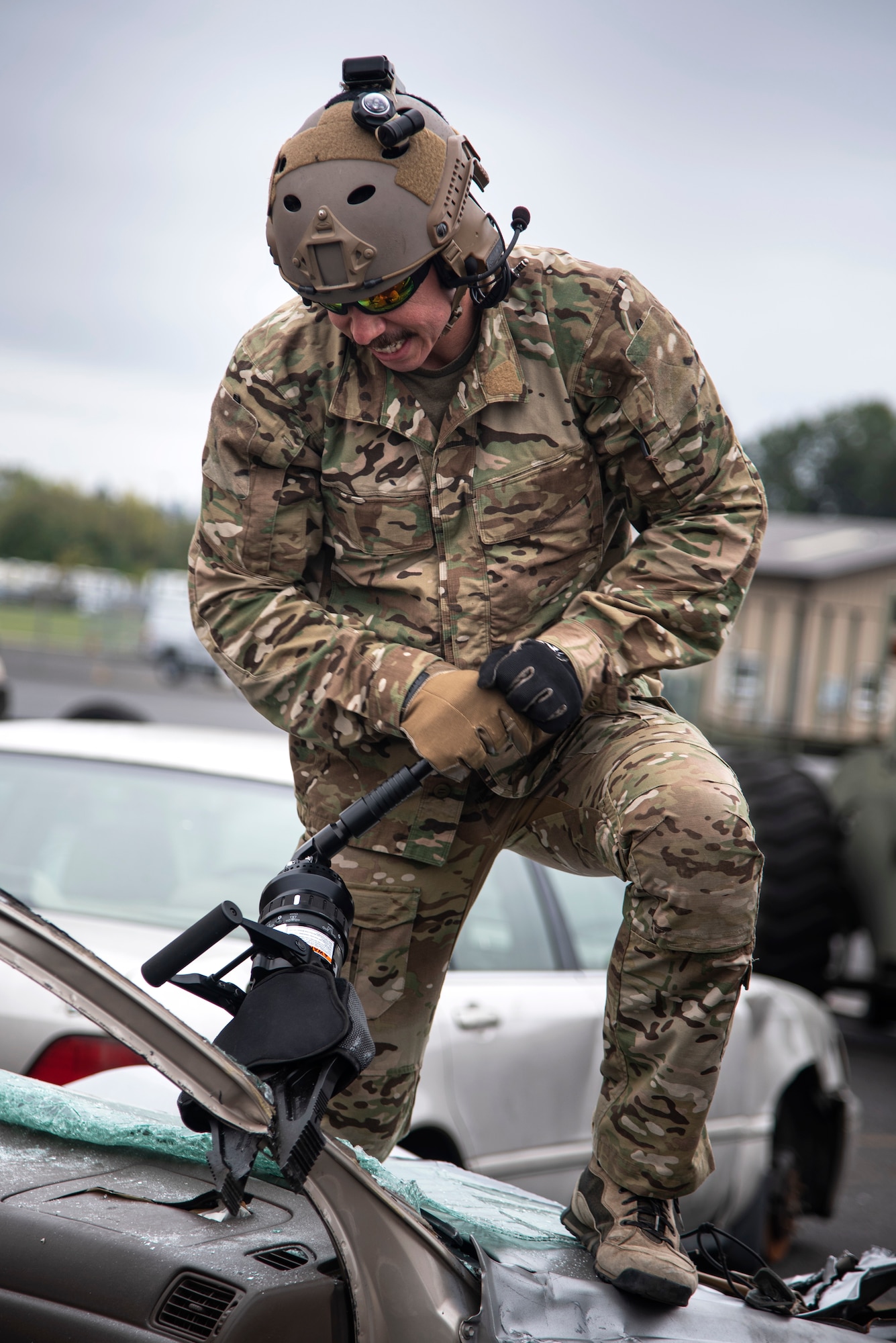 An Oregon Air National Guardsman from the 125th Special Tactics Squadron, uses a tool called the “jaws of life” to conduct extrication training at Portland Air National Guard Base, Portland, Ore., Oct. 8, 2020. Extrication training helps members understand how to remove trapped personnel from crashed aircraft or vehicles. (U.S. Air National Guard photo by Senior Airman Valerie R. Seelye)