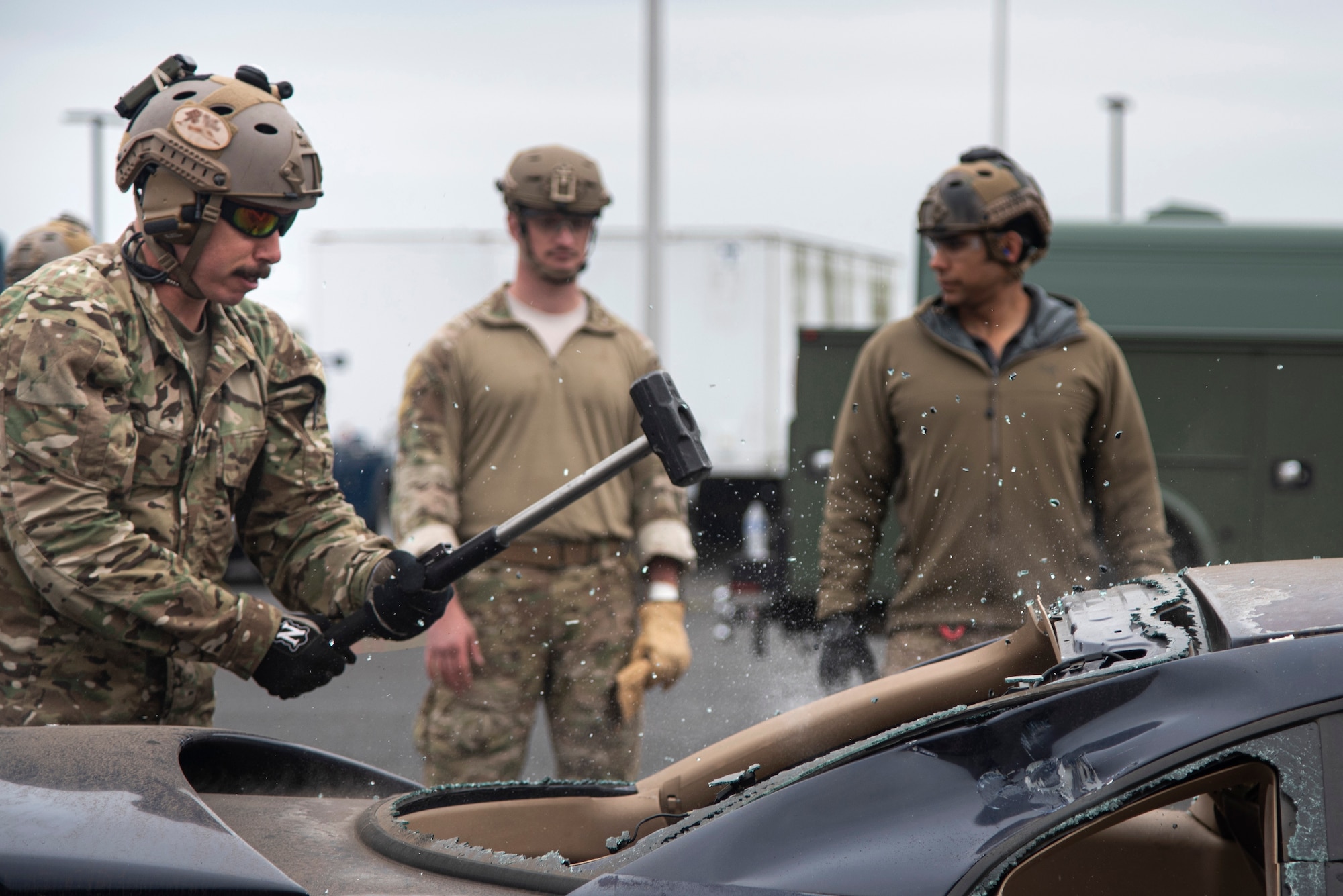Oregon Air National Guard pararescuemen and combat controllers from the 125th Special Tactics Squadron conduct extrication training at Portland Air National Guard Base, Portland, Ore., Oct. 8, 2020, to simulate removing trapped personnel from a vehicle or aircraft. The members may use these techniques in combat environments or humanitarian assistance and disaster response zones. (U.S. Air National Guard photo by Senior Airman Valerie R. Seelye)