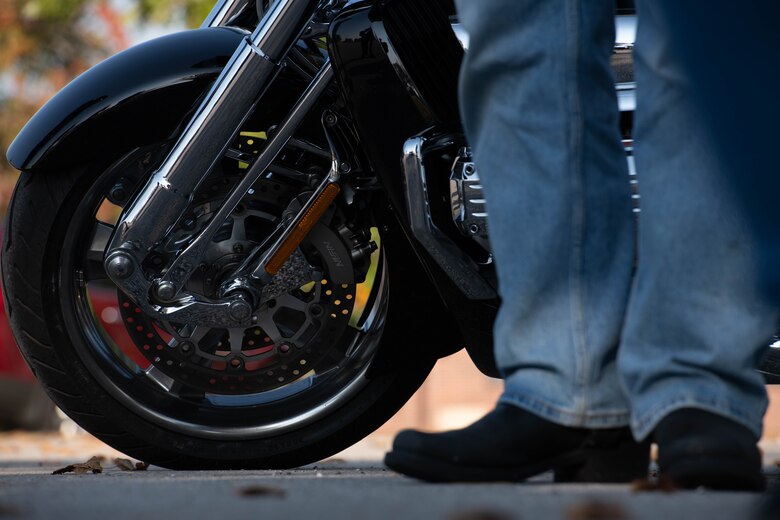 Motorcycle wheel and boots.