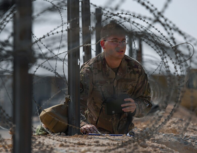 U.S. Air Force Tech. Sgt. Austin Medina, 22nd Expeditionary Weather Squadron non-commissioned officer in charge, observes the area at Camp Buehring, Kuwait, Oct. 2, 2020.