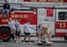 A participant hits a Kaiser sled during the Fire Prevention Week open house, at Misawa Air Base, Japan, Oct. 10, 2020. Fire musters give Airmen from different career fields across the wing an opportunity to test their fitness abilities against one another while experiencing tasks a firefighter would conduct during an emergency. During the event, 35th Civil Engineer Squadron firefighters educated base community members on fire prevention in order to promote a fire-safe lifestyle. (U.S. Air Force photo by Airman 1st Class China M. Shock)