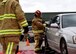 Members of the 35th Civil Engineer Squadron fire department perform a vehicle extraction during the Fire Prevention Week open house, at Misawa Air Base, Japan, Oct. 10, 2020. During the event, 35th CES firefighters educated base community members on fire prevention in order to promote a fire-safe lifestyle. (U.S. Air Force photo by Staff Sgt. Grace Nichols)