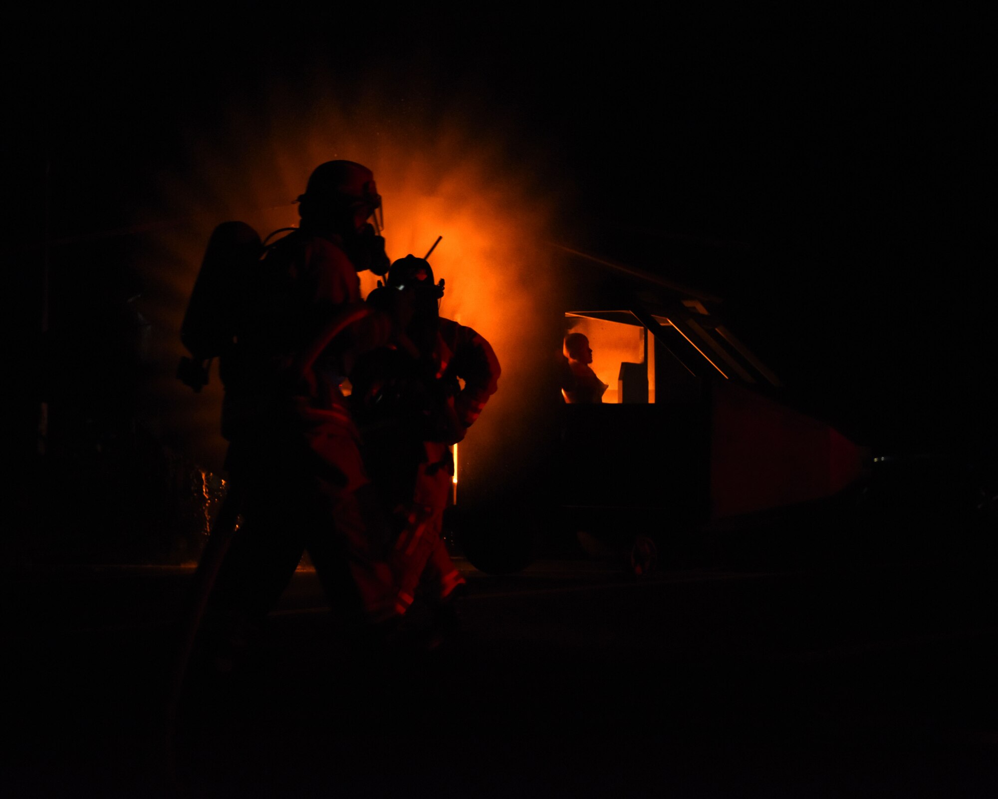 Members of the 35th Civil Engineer Squadron fire department put out a simulated live-fire during a demonstration as part of fire prevention week, at Misawa Air Base, Japan, Oct. 8, 2020. The event is a public fire safety observance sponsored by the National Fire Protection Association. Annually, NFPA creates a unique campaign slogan to help educate people on safety concepts. (U.S. Air Force photo by Staff Sgt. Grace Nichols)