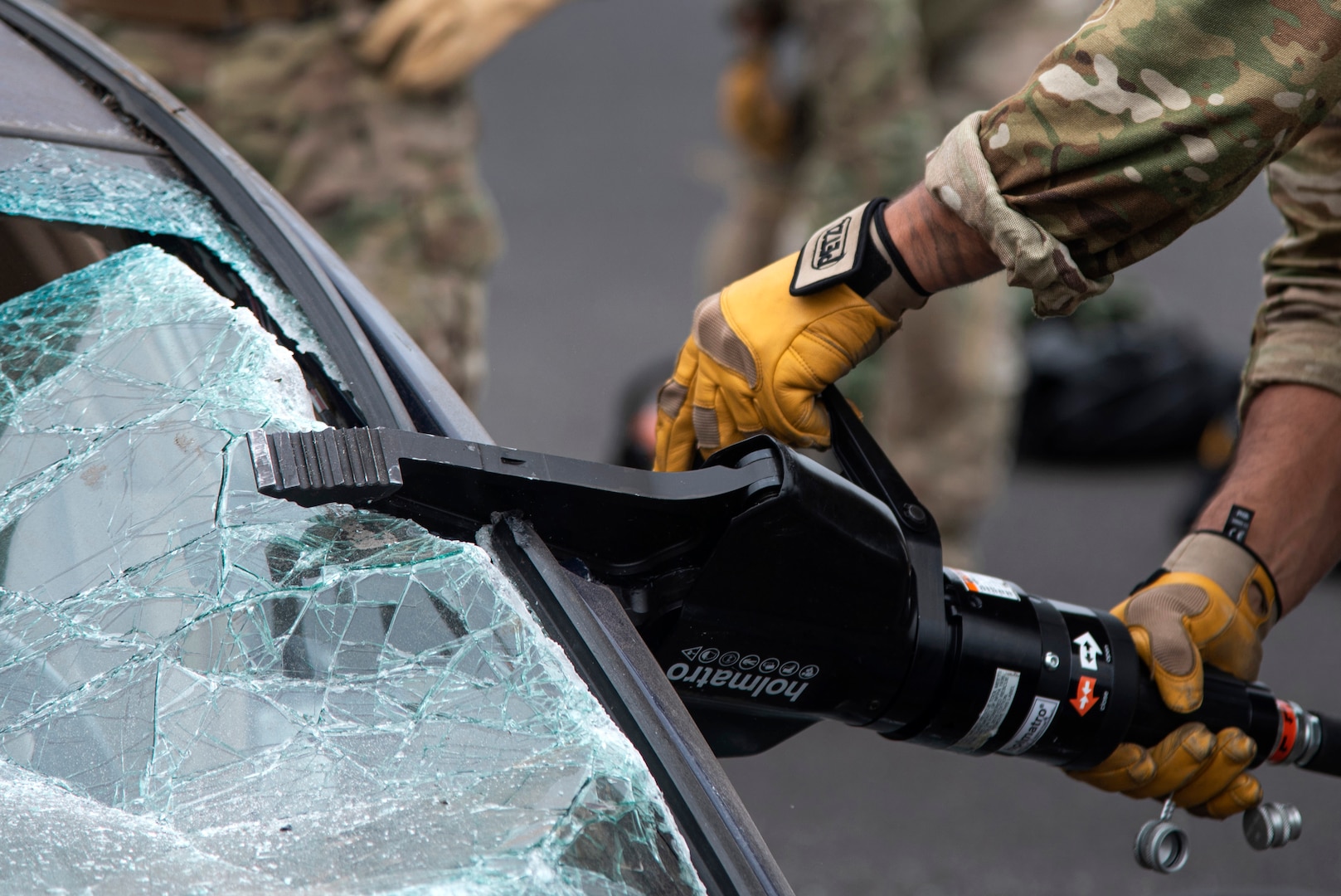 A member of the Oregon Air National Guard's 125th Special Tactics Squadron uses the “jaws of life” tool to conduct extrication training at Portland Air National Guard Base, Portland, Ore., Oct. 8, 2020. The training allowed members to use specialty tools in a controlled environment.