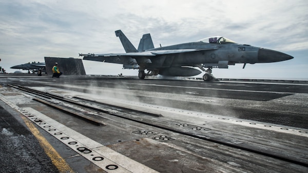 An F/A-18E assigned to the “Royal Maces” of Strike Fighter Squadron (VFA) 27 launches off the flight deck of the aircraft carrier USS Ronald Reagan (CVN 76) while conducting security and stability operations in the South China Sea. Ronald Reagan, the flagship of Carrier Strike Group 5, provides a combat-ready force that protects and defends the U.S. as well as the collective maritime interests of its allies and partners in the Indo-Pacific.