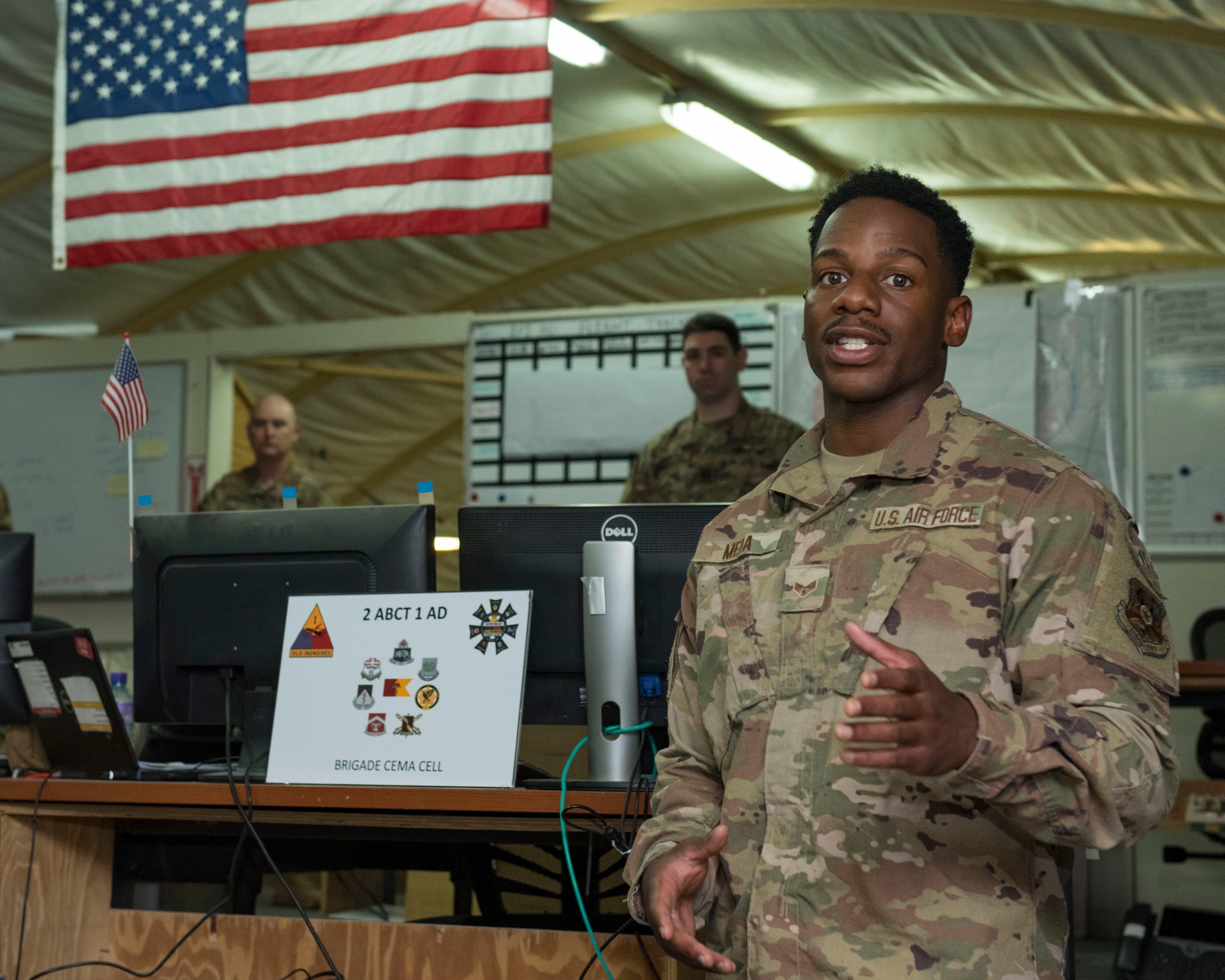 U.S. Air Force Senior Airman Marquise Meda, 22nd Expeditionary Weather Squadron combat weather forecaster, briefs a unit at Camp Buehring, Kuwait, Oct. 2, 2020.