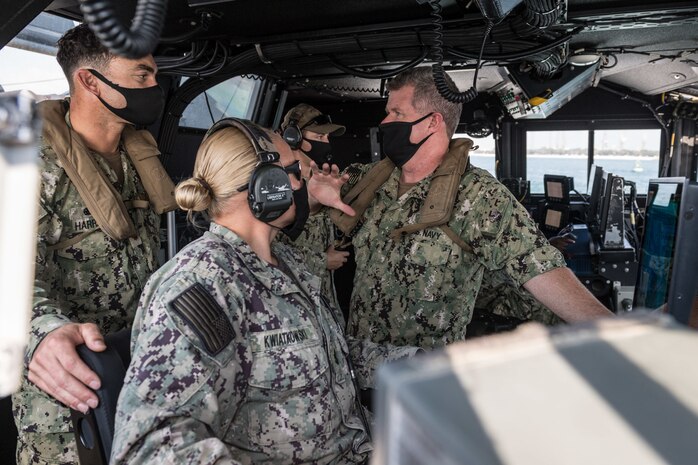 201015-N-KC128-0122 NAVAL SUPPORT ACTIVITY BAHRAIN (Oct. 15, 2020) - Vice Adm. Samuel Paparo, right, commander of U.S. Naval Forces Central Command, U.S. 5th Fleet and Combined Maritime Forces, speaks with the crew of a Mark VI patrol craft assigned to Commander Task Force (CTF) 56, during an underway in the Arabian Gulf, Oct. 15. CTF 56 is responsible for the planning and execution of expeditionary missions in the U.S. 5th Fleet area of operations in support of naval operations to ensure maritime stability in the Central Region, connecting the Mediterranean and Pacific through the Western Indian Ocean and three strategic chokepoints to the free flow of global commerce. (U.S. Navy photo by Mass Communication Specialist 1st Class Daniel Hinton)