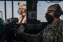 201015-N-KC128-0229 NAVAL SUPPORT ACTIVITY BAHRAIN (Oct. 15, 2020) - Sailors assigned to Commander, Task Force (CTF) 56 stand watch aboard a Mark VI patrol craft during an underway in the Arabian Gulf, Oct. 15. CTF 56 is responsible for the planning and execution of expeditionary missions in the U.S. 5th Fleet area of operations in support of naval operations to ensure maritime stability in the Central Region, connecting the Mediterranean and Pacific through the Western Indian Ocean and three strategic chokepoints to the free flow of global commerce. (U.S. Navy photo by Mass Communication Specialist 1st Class Daniel Hinton)