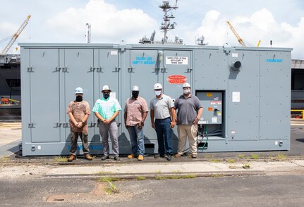 The main players from the Production Environment Team (Code 990E) are Industrial Equipment Work Leader Ricky McCadden, Environmental Supervisor Blake Kalaikai, Engineering Technician and Project Manager Kamau Adams, and Environmental Zone Manager Patrick Williams.