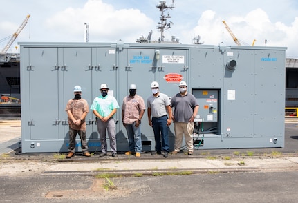 The main players from the Production Environment Team (Code 990E) are Industrial Equipment Work Leader Ricky McCadden, Environmental Supervisor Blake Kalaikai, Engineering Technician and Project Manager Kamau Adams, and Environmental Zone Manager Patrick Williams.