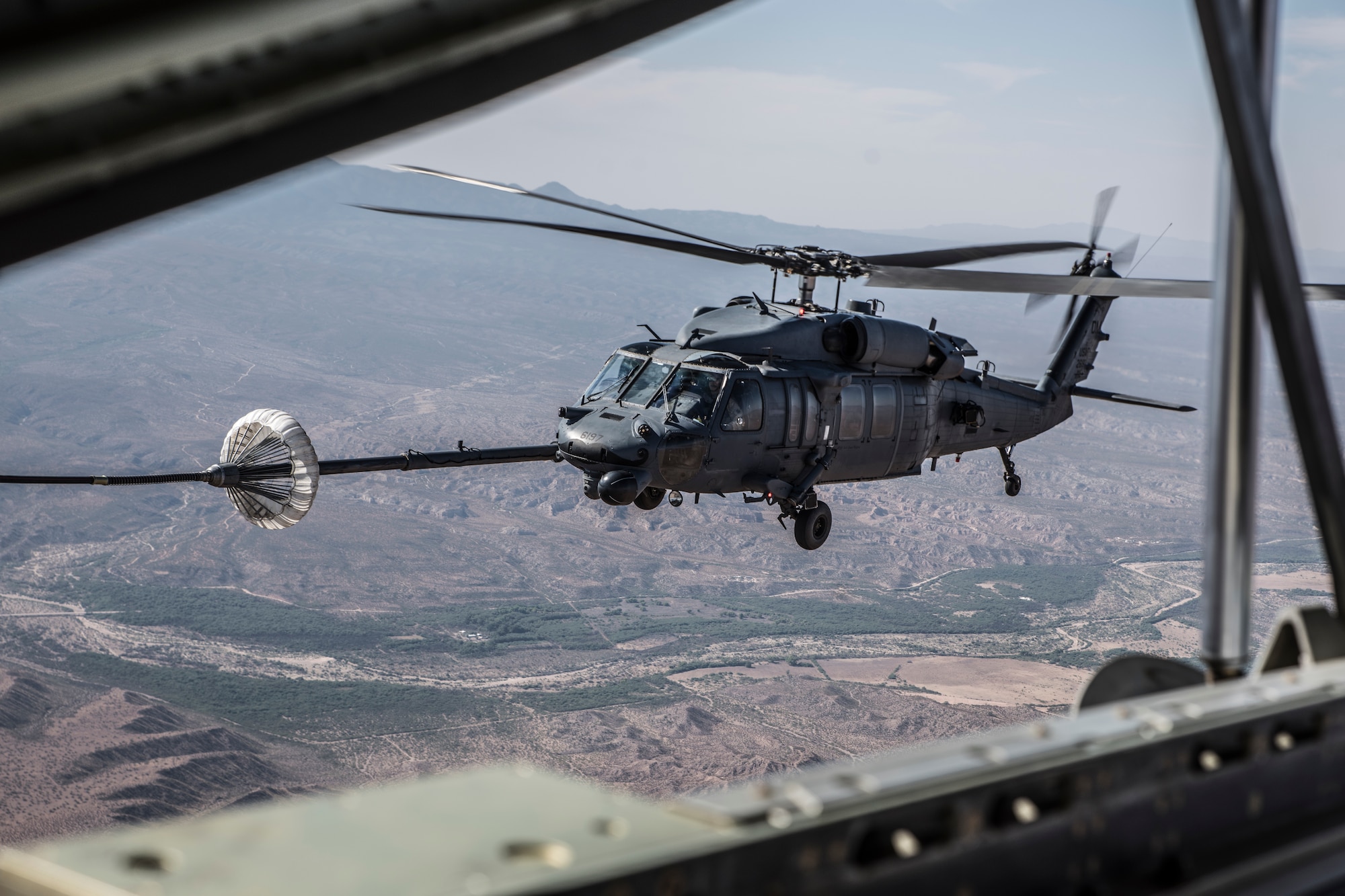 A photo of helicopters flying