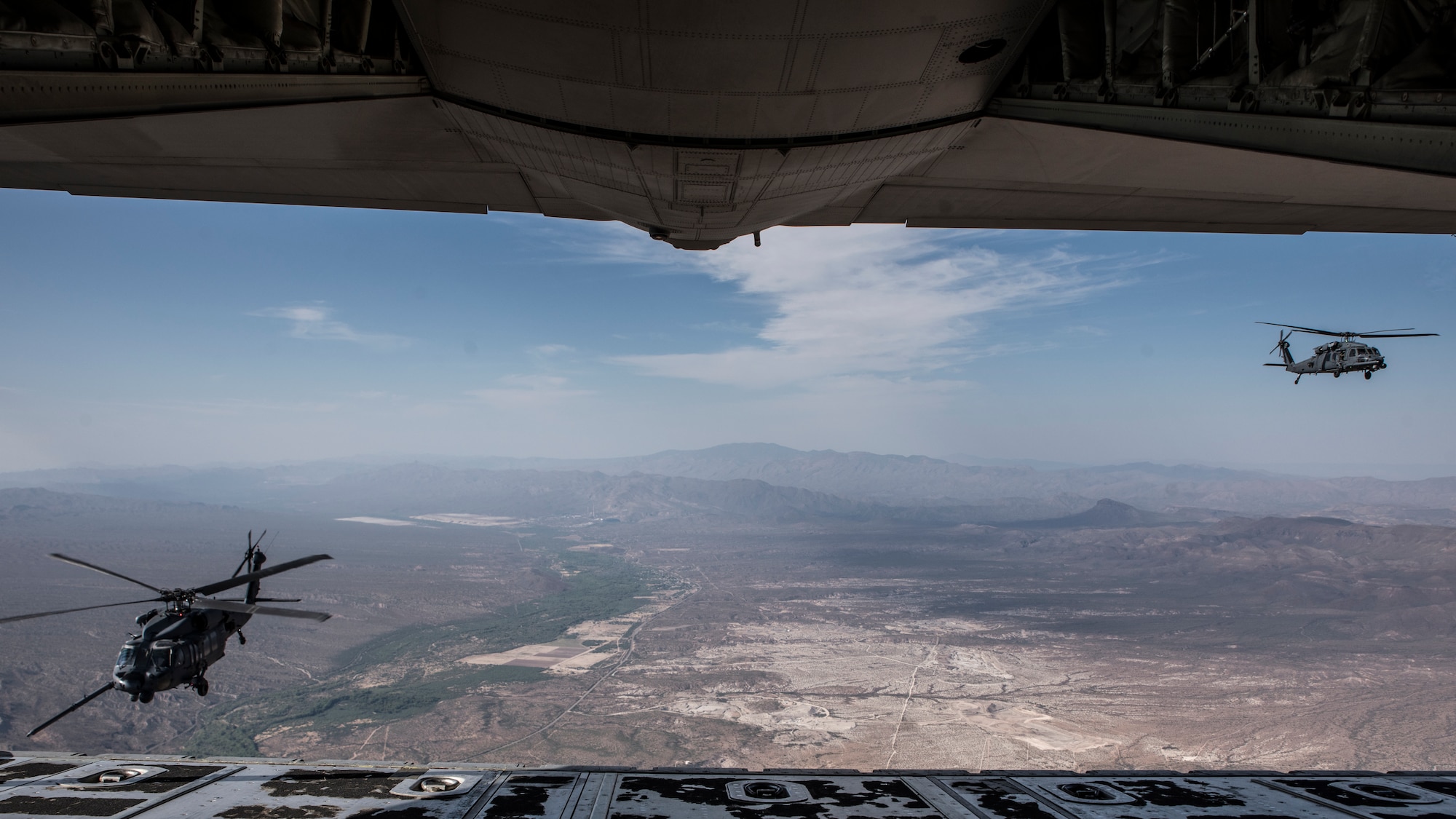 A photo of helicopters flying