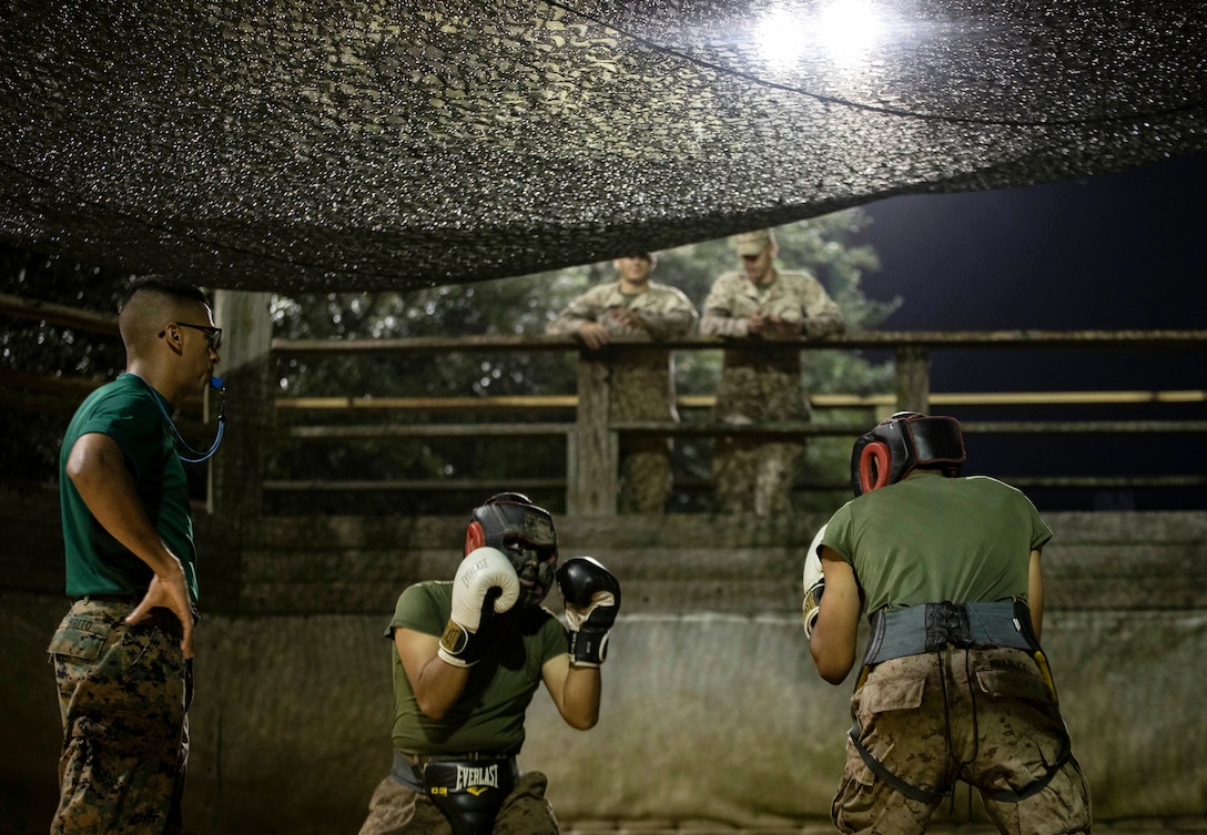 Recruits with Mike Company, 3rd Recruit Training Battalion spar with each other during Crucible boxing bouts on Marine Corps Recruit Depot Parris Island, S.C. Oct. 8, 2020. The Crucible is the final test of physical and mental endurance recruits will face before earning the title United States Marine, and is a culmination of all of the skills learned throughout recruit training.



(U.S. Marine Corps photo by Sgt. Dana Beesley)