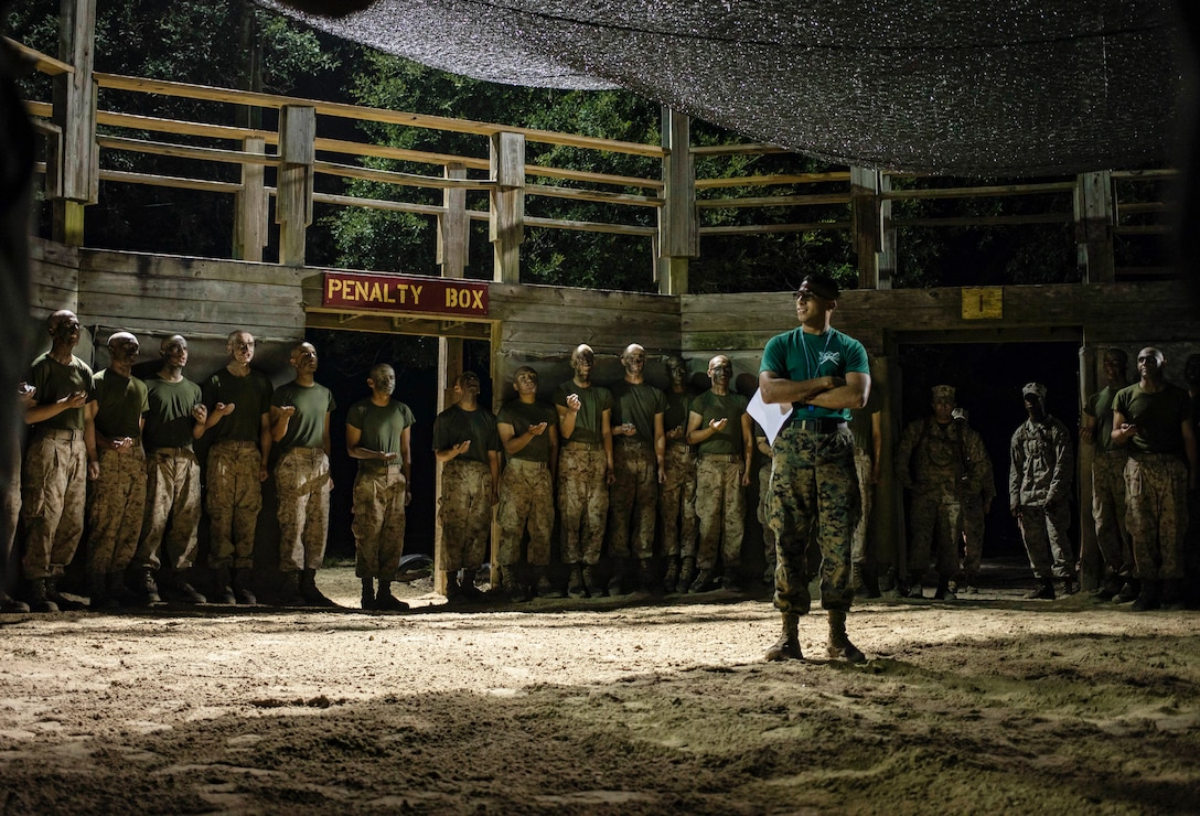 Recruits with Mike Company, 3rd Recruit Training Battalion, listen to instructions and their safety brief prior to Crucible boxing bouts on Marine Corps Recruit Depot Parris Island, S.C. Oct. 8, 2020. The Crucible is the final test of physical and mental endurance recruits will face before earning the title United States Marine, and is a culmination of all of the skills learned throughout recruit training.



(U.S. Marine Corps photo by Sgt. Dana Beesley)