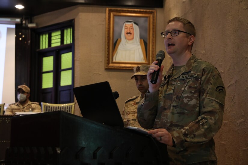 U.S. Army Judge Advocate Maj. Joshua Goering presents at a legal exchange in Kuwait on Oct. 12, 2020. The legal exchange brought together military judges from Kuwait, Judge Advocates from the U.S. Army and U.S. Air Force, and Brigade Commanders from the Kuwait Land Forces. (U.S. Army photo by Sgt. Trevor Cullen)
