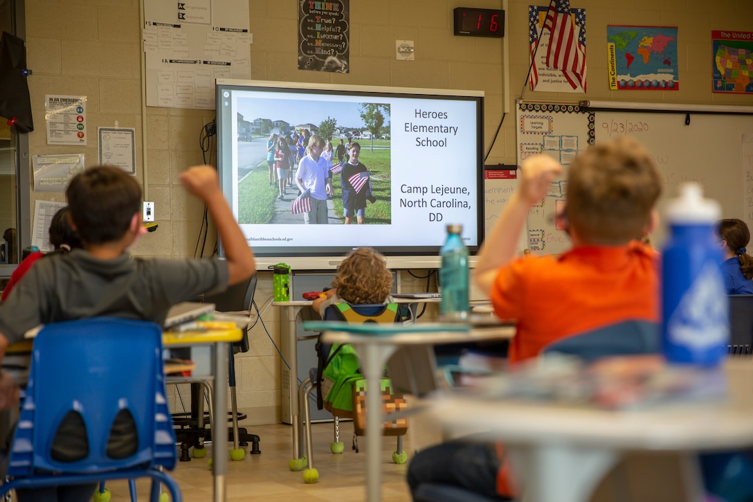 Students at Heroes Elementary School celebrate as their school is named a 2020 National Blue Ribbon School during a virtual ceremony on Marine Corps Base Camp Lejeune, North Carolina, Sept. 24, 2020. The United States Department of Education awards the National Blue Ribbon to schools that have shown a tremendous amount of academic excellence and improvement. (U.S. Marine Corps photo by Lance Cpl. Christian Ayers)