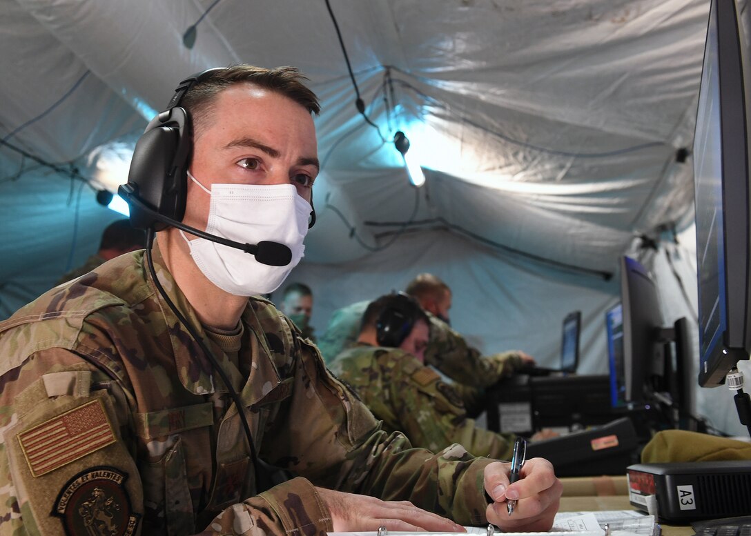 Maj. Dominic Perry, 379th Space Range Squadron, is Range Controlling during his first shift of Space Range Operations during the 379th SRS Field Training Exercise, Sept. 10-13, 2020, at the United States Air Force Academy's Field Engineering Readiness Laboratory, Colorado. (U.S. Air Force photo by Dennis Rogers)