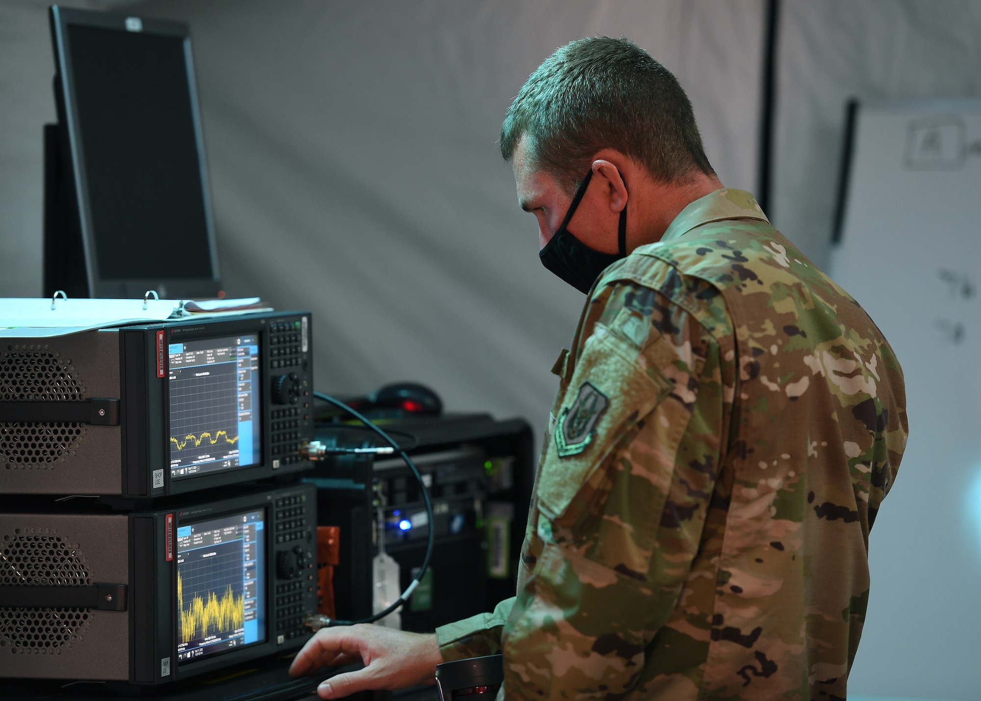 Staff Sgt. Shaun Gutierrez, 379th Space Range Squadron, calibrates the Spectrum Analyzer during the 379th SRS Field Training Exercise, Sept. 10-13, 2020, at the United States Air Force Academy's Field Engineering Readiness Laboratory, Colorado. (U.S. Air Force photo by Dennis Rogers)