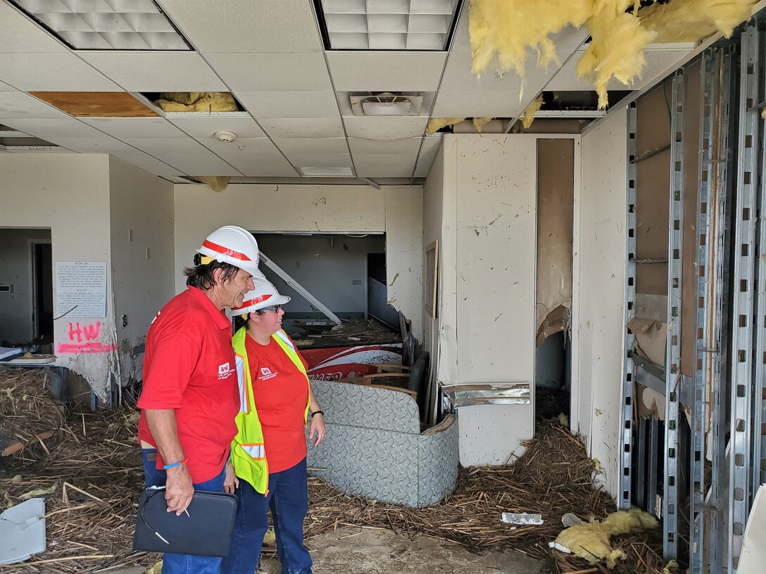 IN THE PHOTO, members of the Infrastructure Assessment Planning and Response Team assess an area damaged by Hurricane Laura in southwestern Louisiana. The Corps evaluated a total of 52 fire stations, 53 water and wastewater facilities, and one hospital while deployed to Louisiana. (Courtesy photo)