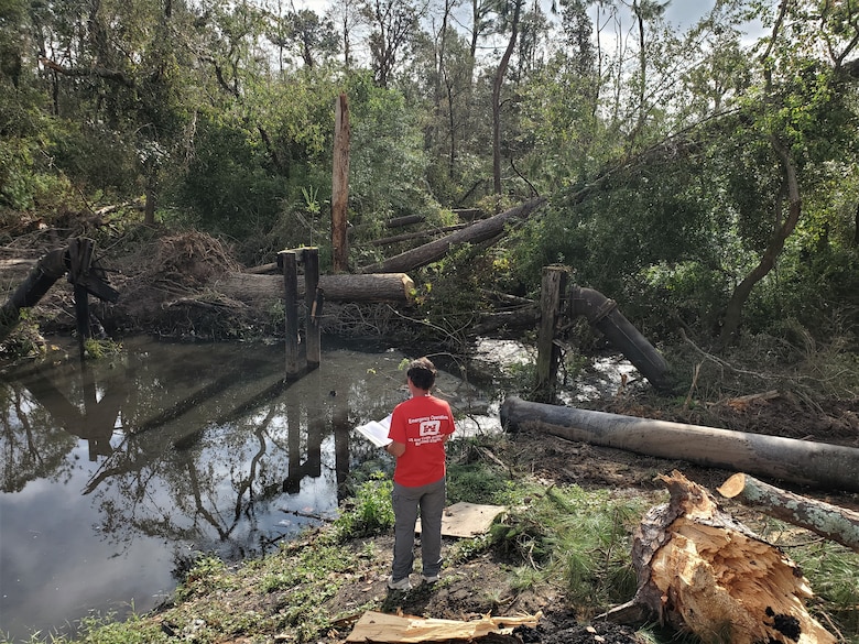IN THE PHOTO, a member of the Infrastructure Assessment Planning and Response Team assess an area damaged by Hurricane Laura in southwestern Louisiana. The Corps evaluated a total of 52 fire stations, 53 water and wastewater facilities, and one hospital while deployed to Louisiana. (Courtesy photo)