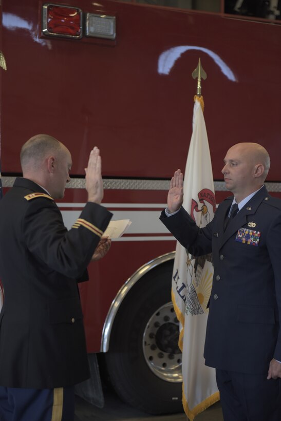 Man taking oath of office.