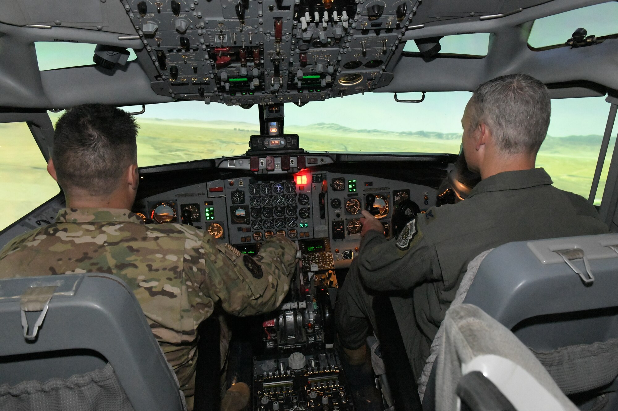 men in flight simulator