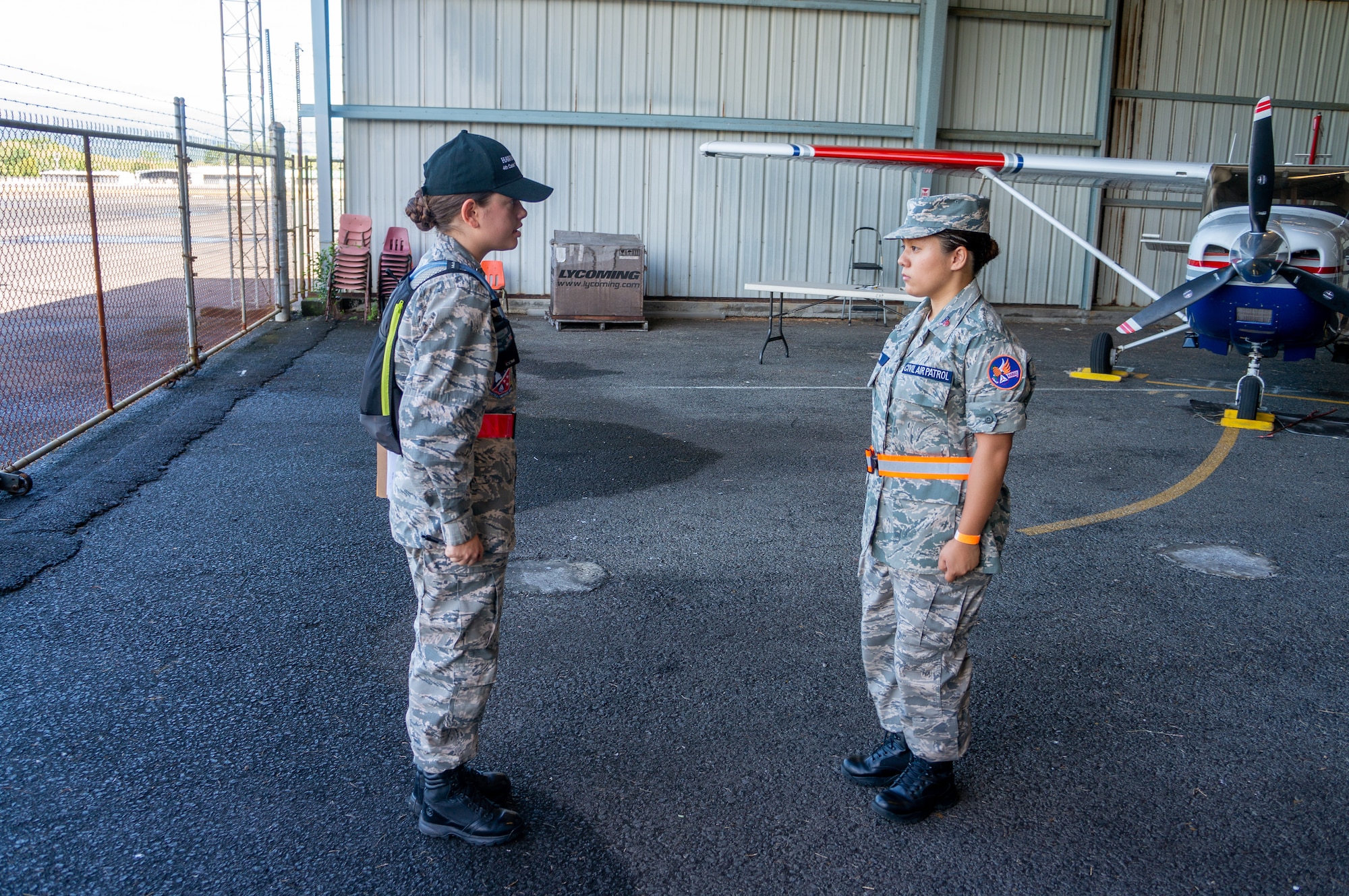 Civil Air Patrol Cadet 2nd Lt. Jessica Cogan and Cadet Tech. Sgt. Zana Kimura, CAP Lyman Field Composite Squadron, check-in students at Kilauea Military Camp, Hawaii, July 20, 2019. Cadets participated in a six-day encampment to develop leadership skills and military discipline, and learn aerospace sciences. (Courtesy Photo)