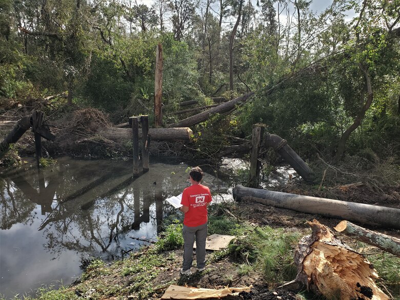 IN THE PHOTO, a member of the Infrastructure Assessment Planning and Response Team assess an area damaged by Hurricane Laura in southwestern Louisiana. The Corps evaluated a total of 52 fire stations, 53 water and wastewater facilities, and one hospital while deployed to Louisiana. (Courtesy photo)