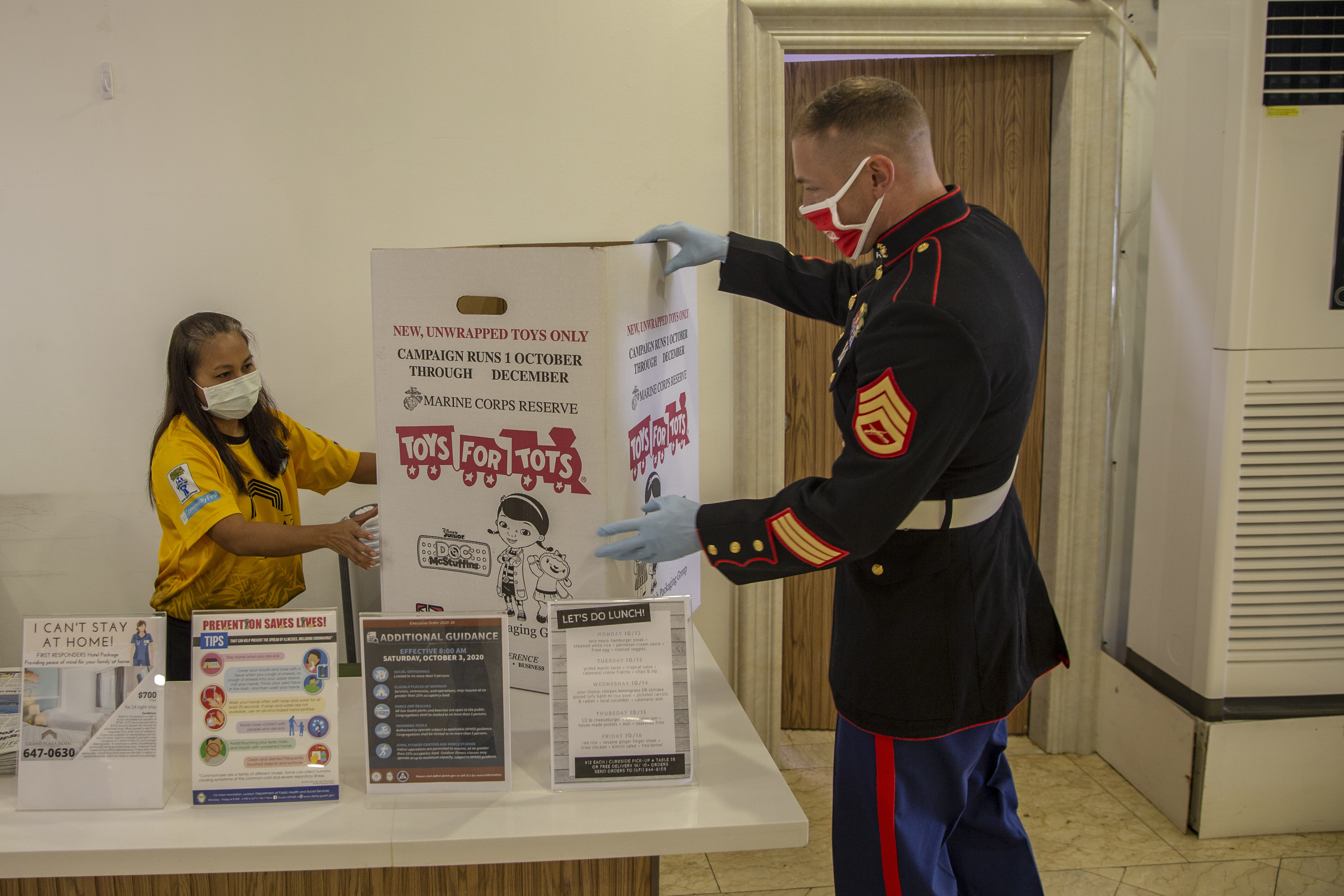 Staff Sgt. John Ewald, Assistant Coordinator for Toys for Tots on Guam and the Commonwealth of the Northern Mariana Islands delivers donation boxes on Guam to commence the 2020 Toys for Tots Campaign.
