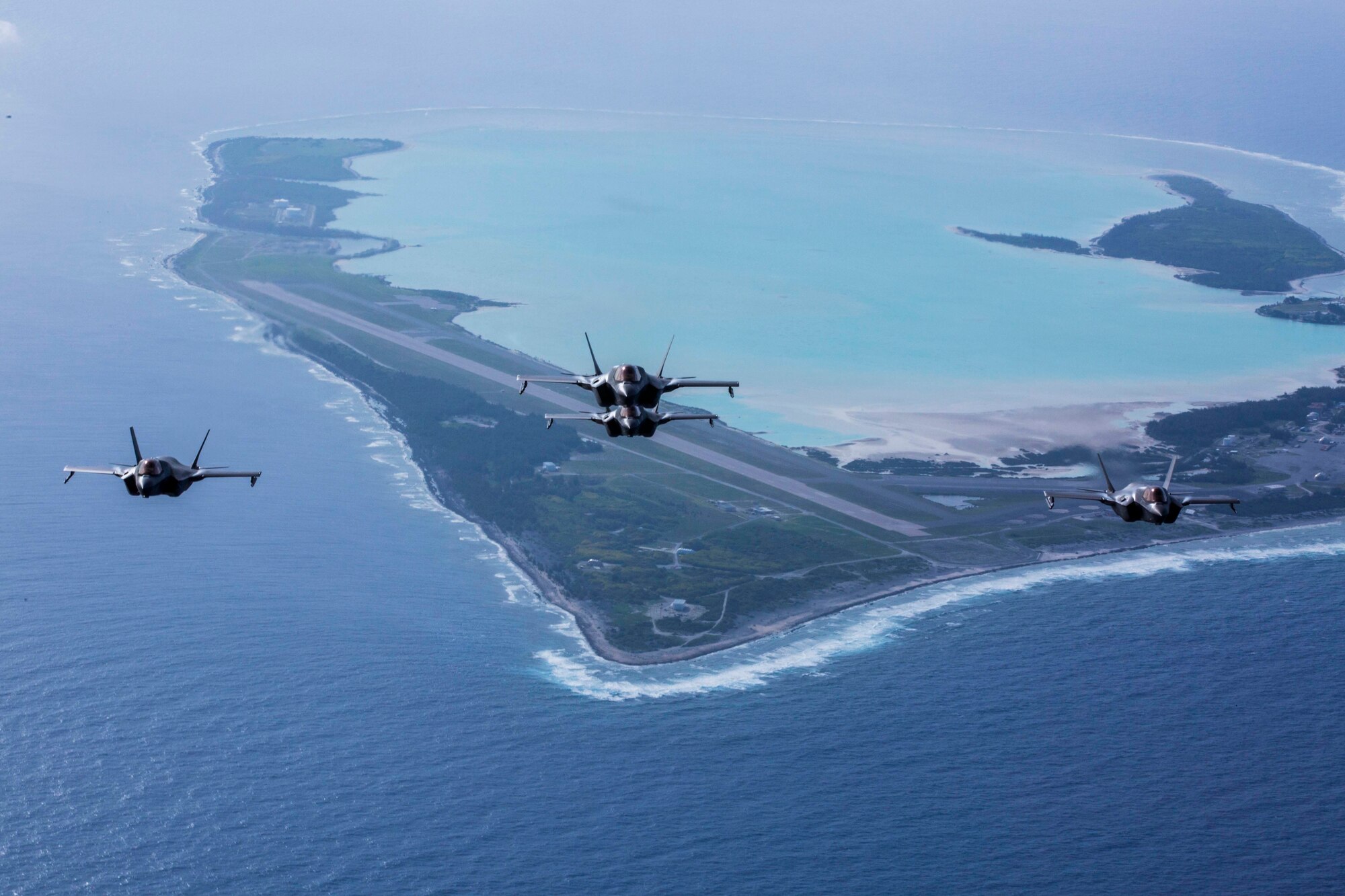 F-35B Lightning IIs with Marine Fighter Attack Squadron 211, the Wake Island Avengers, 13th Marine Expeditionary Unit (MEU), fly over Wake Island