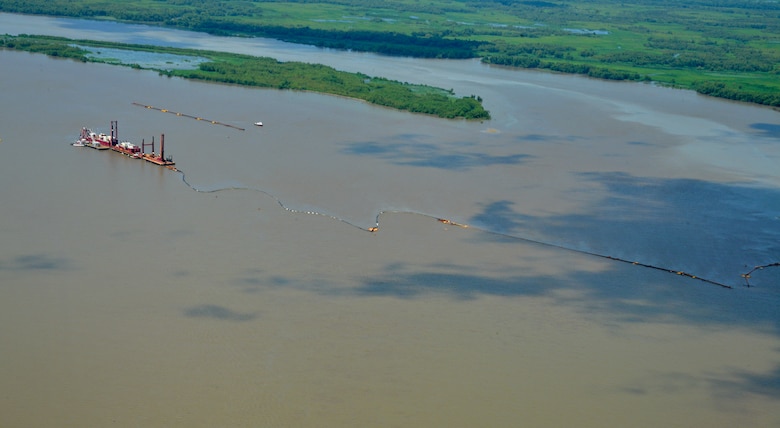 The California dredges the new navigation channel formed on the eastern side of Horshoe Bend Island. This project was selected by the U.S. Army Corps of Engineers New Orleans District as a placement option for dredged shoal material. The island was self-designed by the strategic placement of sediment on the Atchafalaya River, allowing the river’s energy to disperse the sediment ⸺ another excellent example of harnessing natural systems and processes to engineer with nature. The project resulted in numerous engineering and environmental benefits, including a reduced need for dredging and increased habitat for a variety of species. (Wings of Anglers, courtesy of Great Lakes Dredge and Dock Company photo)