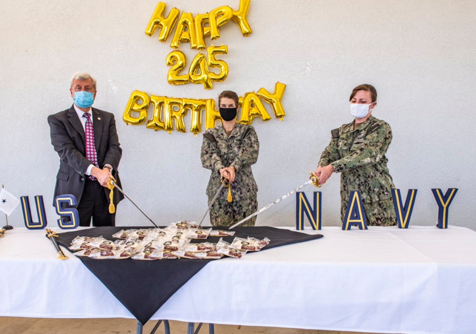 Navy birthday cake cutting