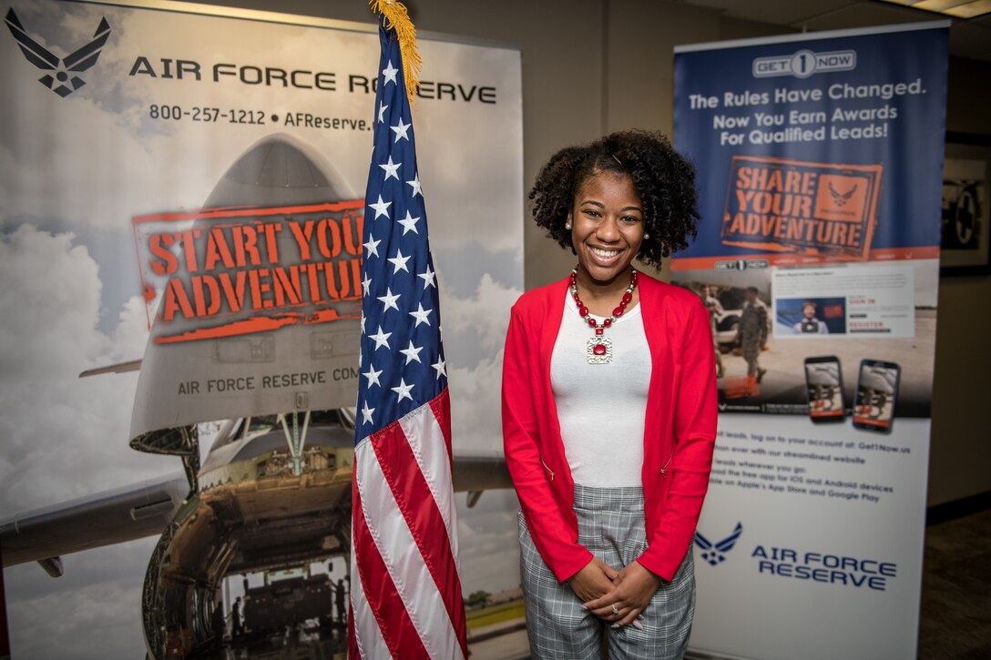Dominique Burrell poses for a photo  Oct. 2 2020, following an enlistment ceremony at the 932nd AW Headquarters building, Scott Air Force Base, Illinois. Burrell will continue her family’s military legacy. “I will become part of a bigger family,” said Burrell “I hope to someday become an officer and look forward to what the Air Force has to provide [me], such as resiliency.”  (U.S. Air Force photo by Christopher Parr)