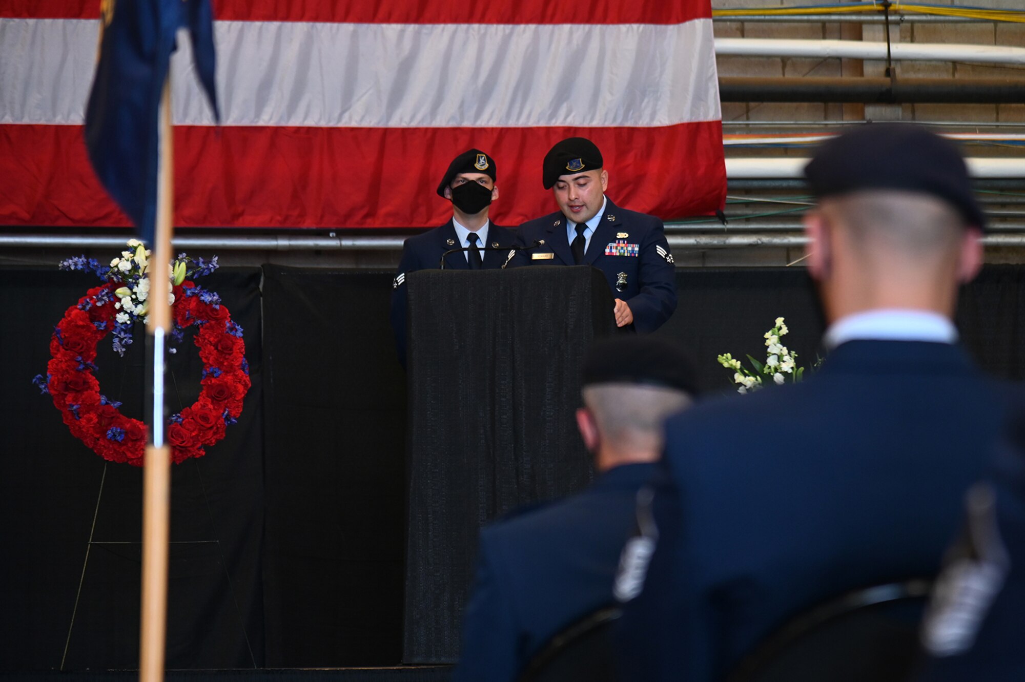 Members of the 66th Security Forces Squadron salute during Senior Airman Jason “Khai” Phan’s memorial service at Hanscom Air Force Base, Mass., Oct. 16. During the ceremony, wingmen remembered the fallen Airman, who died in a non-combat incident Sept. 12 while serving overseas. (U.S. Air Force photo by Linda LaBonte Britt)