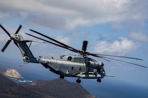 A CH-53 Super Stallion with Marine Heavy Helicopter Squadron 463 maneuvers during a casualty evacuation exercise, Marine Corps Base Hawaii, Oct. 8, 2020. The exercise aimed to increase the expeditionary readiness of Marines within HQBN. (U.S. Marine Corps photo by Lance Cpl. Shane Linder)