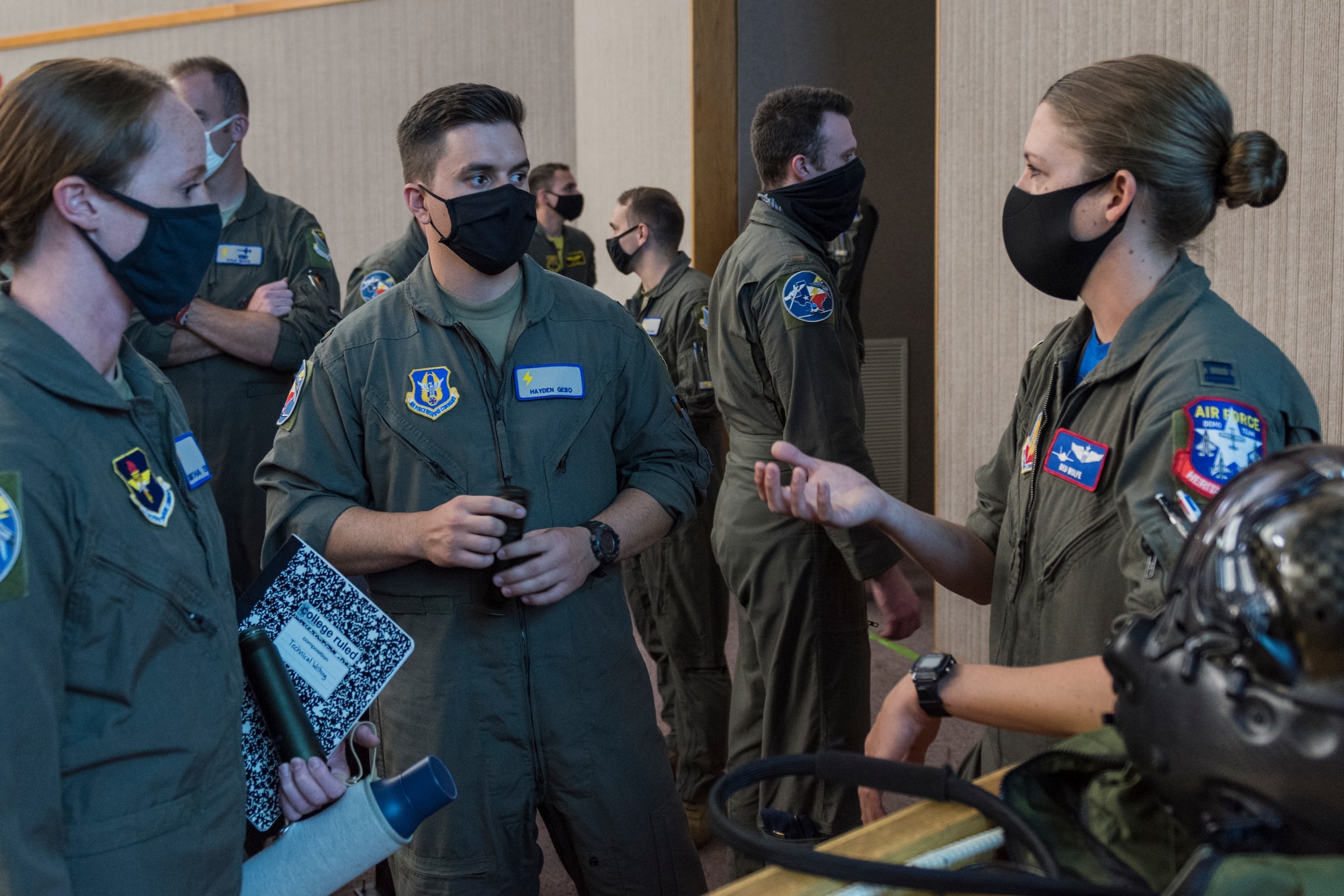 Capt. Kristin Wolfe, F-35A demonstration team pilot, a Laughlin graduate of SUPT class 12-15, talks about life as a fighter pilot to 47th Student Squadron students, 2nd Lt. Samantha Ess and 2nd Lt. Hayden Gebo. “We hope this was an exciting, encouraging experience for all of the students,” said Wolfe. “Our goal is to provide a fighter pilot perspective while also giving an overview of the jet’s capabilities to motivate future Air Force pilots.” (U.S. Air Force photo by Senior Anne McCready)