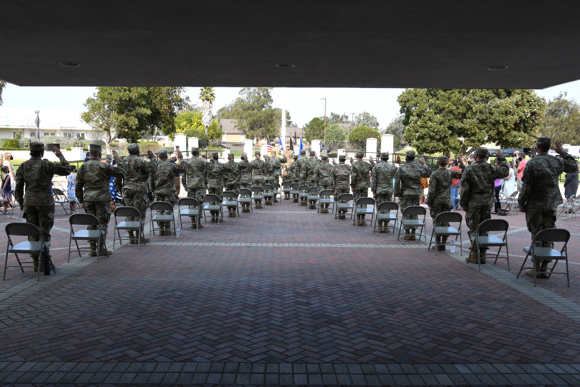 Maj. Gen. John E. Shaw, U.S. Space Force’s Space Operations Command commander, administers the Oath of Office to new Space Force Field Grade Officers during the United States Space Force FGO Induction Ceremony Oct. 16, 2020, at Vandenberg Air Force Base, Calif.